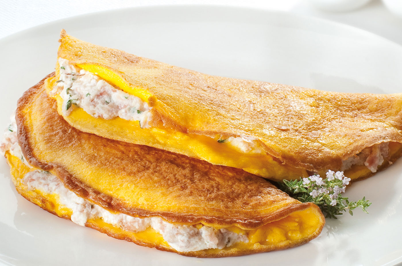 Omelette con prosciutto cotto, ricotta ed erbette