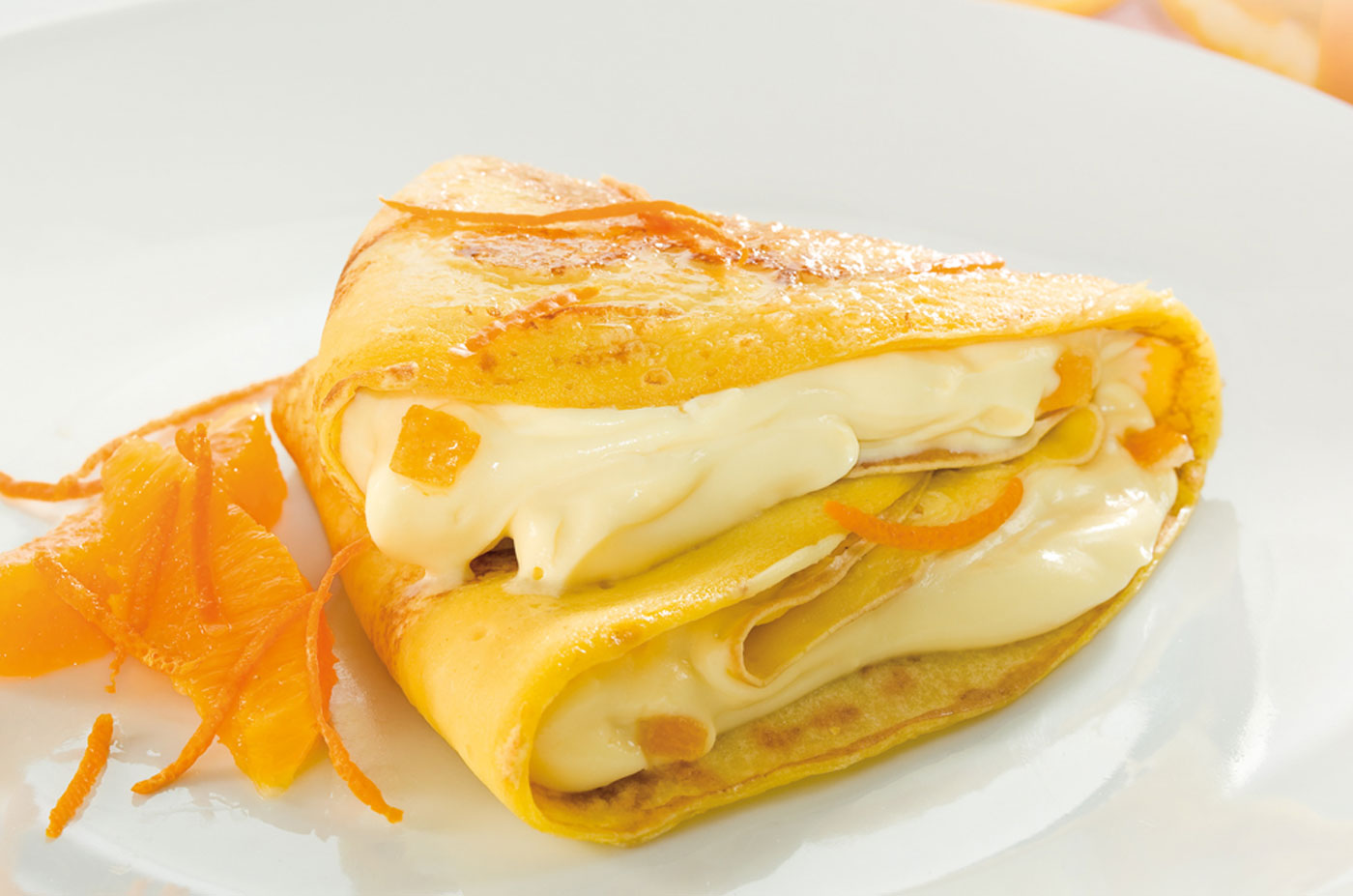Crêpes al mascarpone con scorzette di arancia