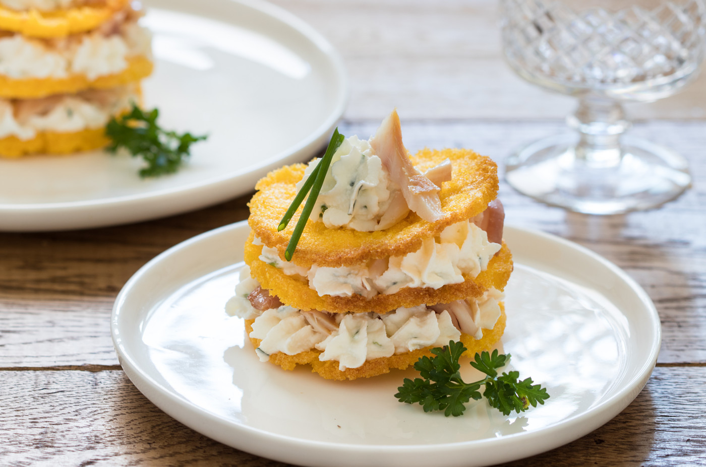 Millefoglie di polenta, ricotta e trota affumicata